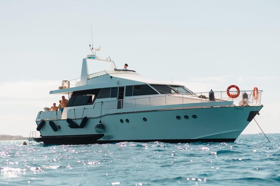 Costa Adeje: Private Yacht Trip with Watersports and Slides - PalmMar aquatic cave and coastal views