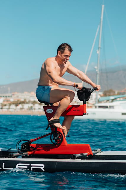 Costa Adeje: Private Yacht Trip with Watersports and Slides - Playa de las Vistas becomes your water-play stop