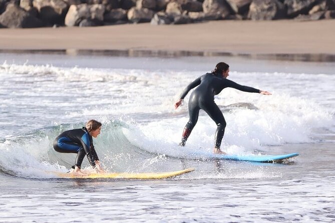 Group Surf Class in Playa de Las Américas with Photographs - Photos, stretching, and the welcome finish