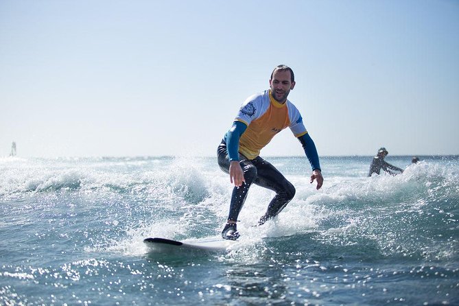 Group Surf Lessons - A beach warm-up before the first wave