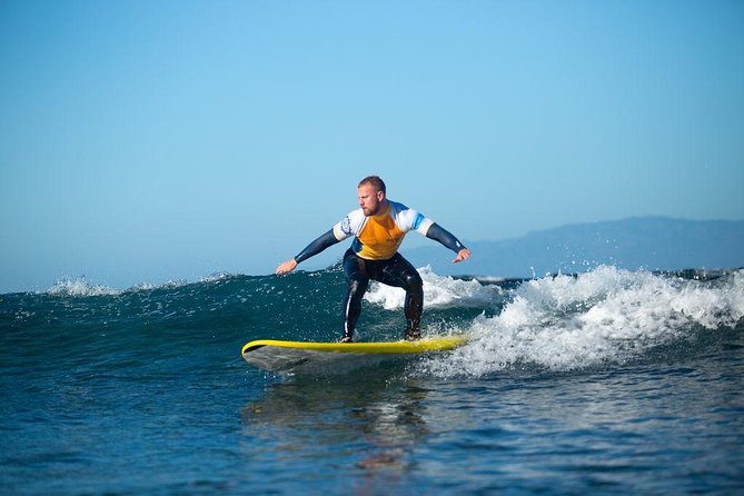 Group Surf Lessons - Moving into the water with a licensed instructor