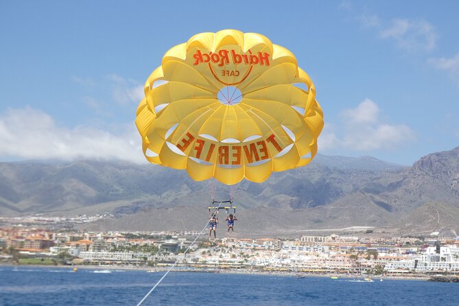 Parasailing flights on the coast of Adeje in Tenerife - Weather, cancellation, and booking timing