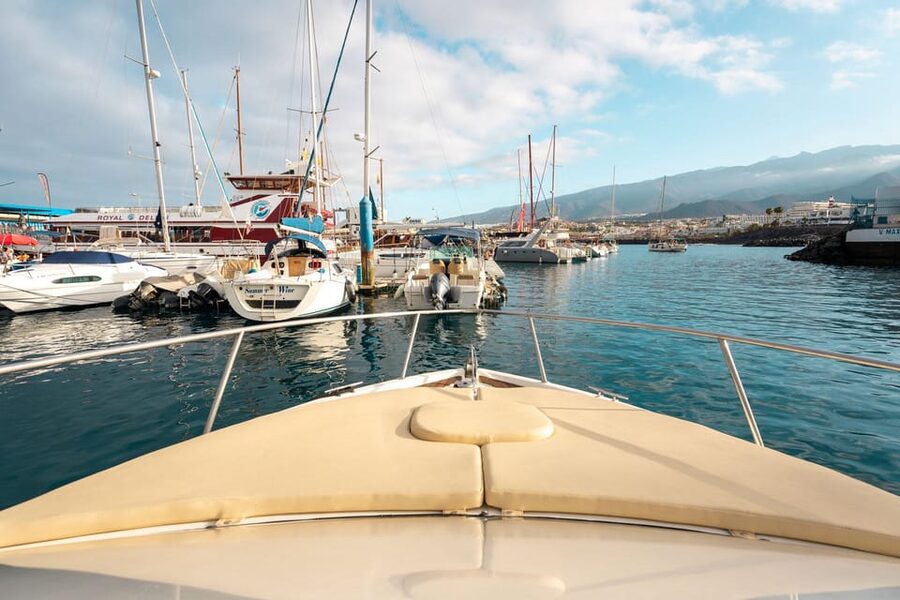 Puerto Colón: Coastal Boat Cruise with Swimming and Snacks - Setting out from Puerto Colón on the Bellamar