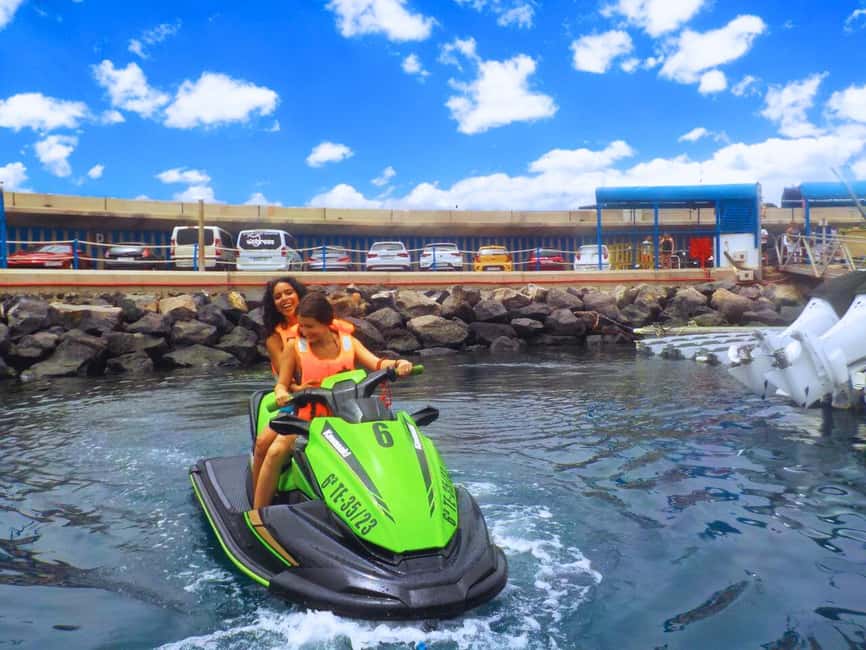 Puerto Colón: Kawasaki Jet Ski Tour Along Tenerife's Coast - Leaving Puerto Colón for the open water