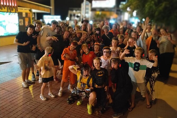 Silent Disco Walking Tours - Sunset turns Costa Adeje into the stage