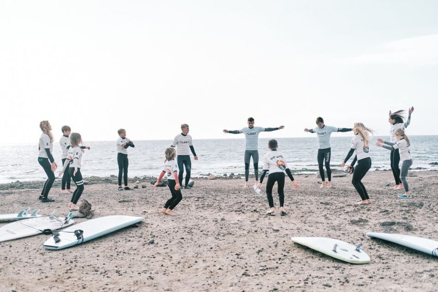 Tenerife: Group Surf Lesson catch your wave - Choosing your board and getting suited up