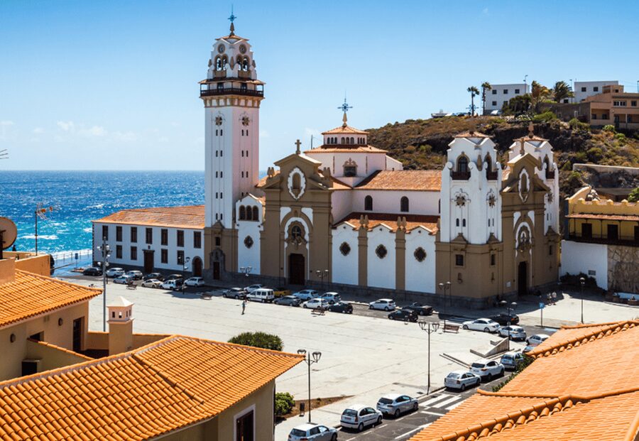 Tenerife: Private Day Tour of the Island with Hotel Pickup - Candelaria and Santa Cruz: faith, civic life, and the capital