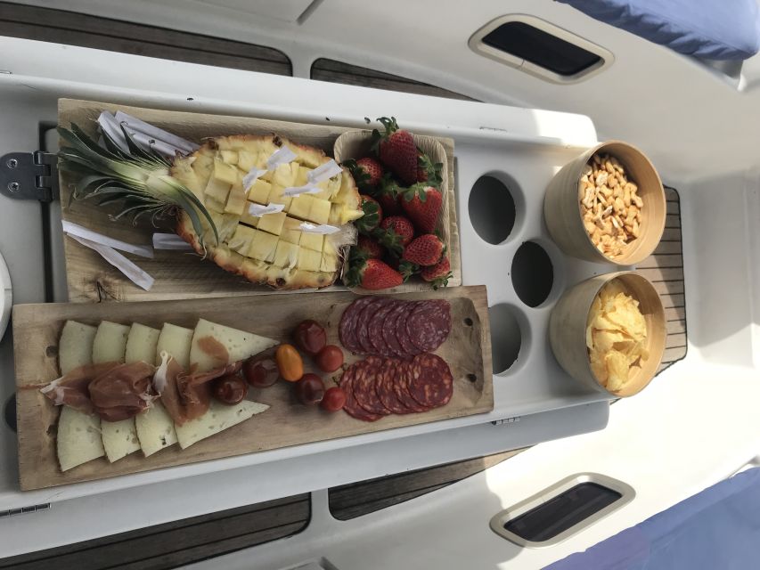 Tenerife: Private Sunset Charter with Drinks and Tapas - Sailing out from Puerto Colón at sunset