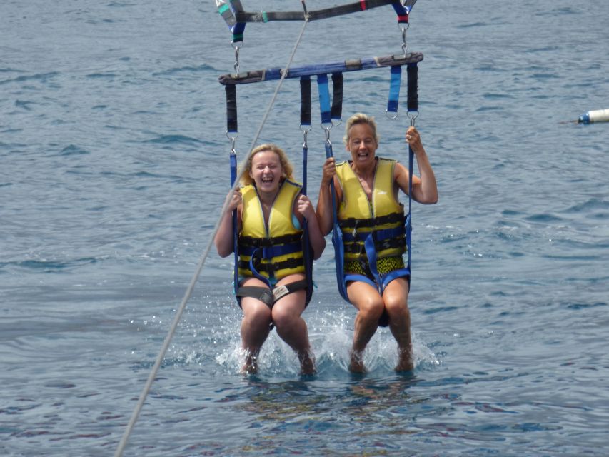 Tenerife South: Parascending Experience with Boat Ride - Landing, swimming, and returning to port