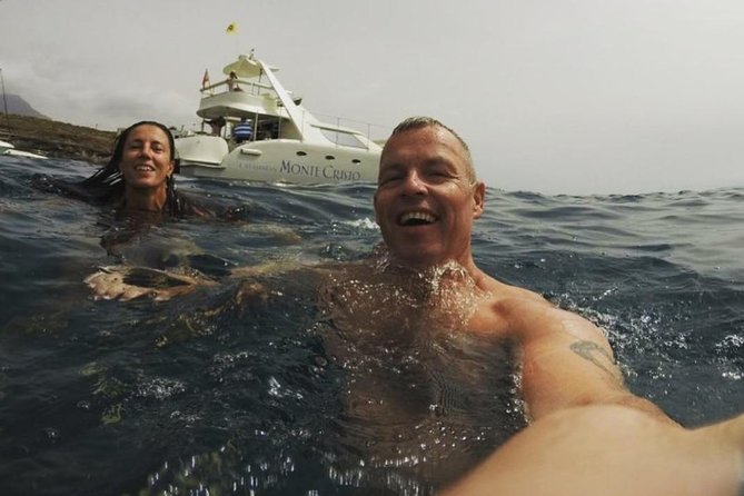Whale Watching Catamaran Cruise with Transfer, Buffet by MC - Handling seasickness and changing weather